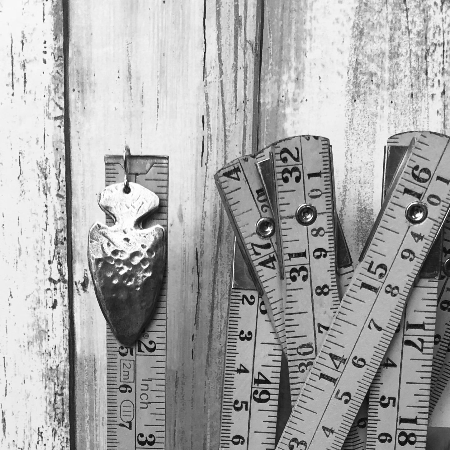 Handcrafted Silver Arrowhead Earrings with a Rustic Touch by iNk Jewelry