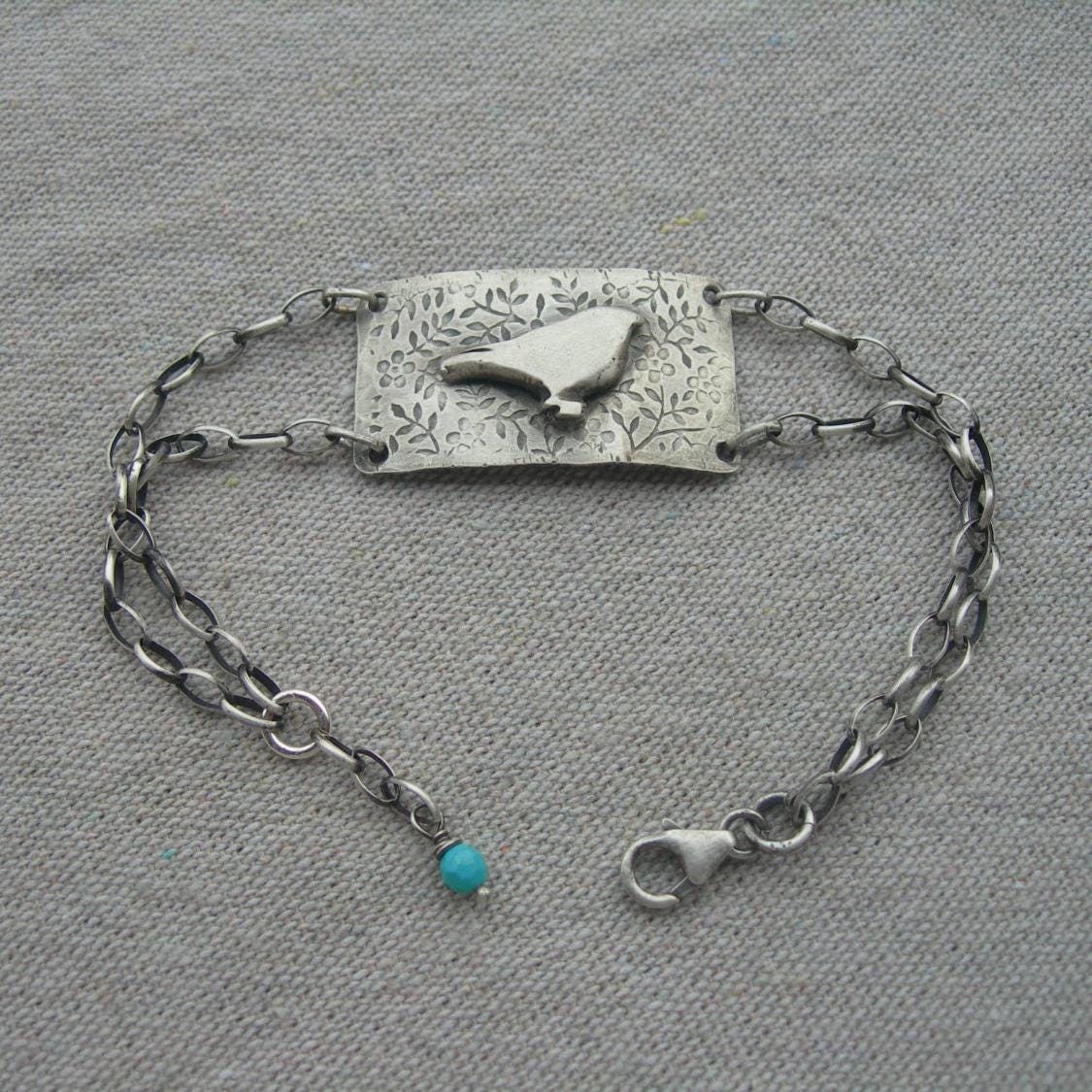 Little Bird Sterling Silver Bracelet by iNk Jewelry