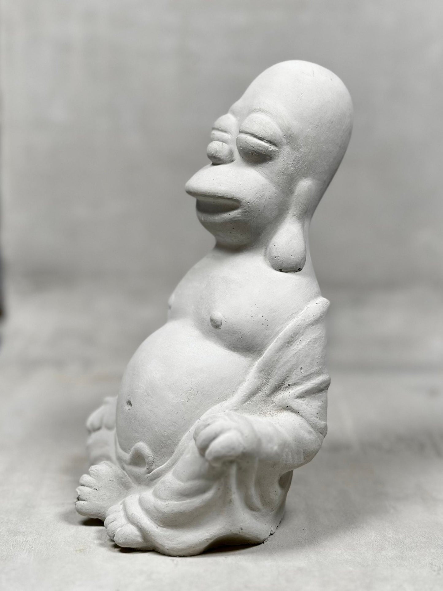 Homer Simpson Buddha concrete by Jon Ansted