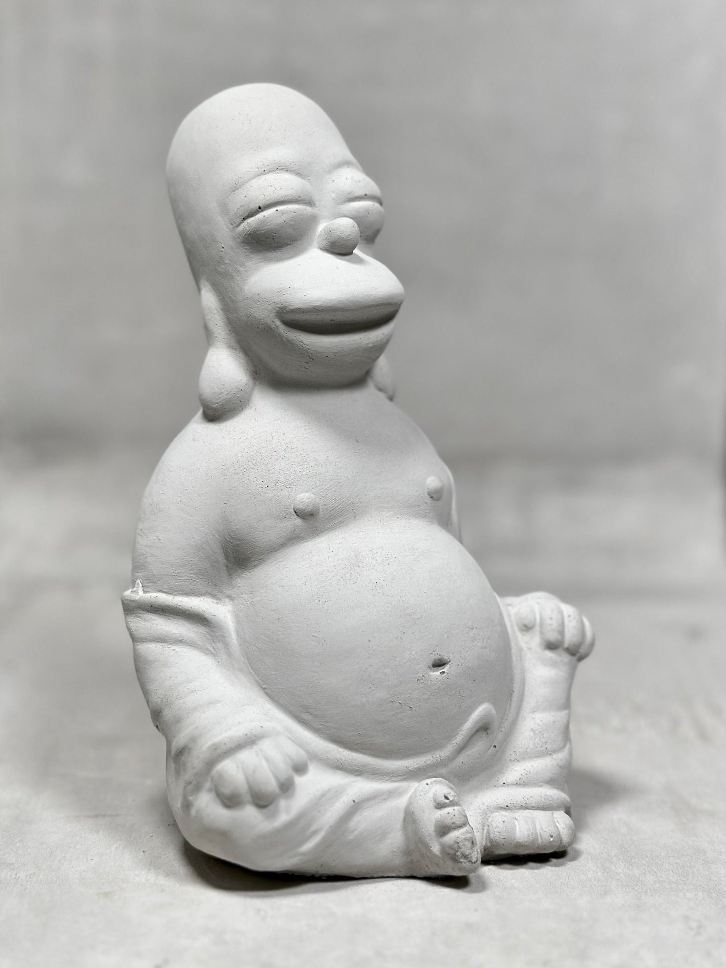 Homer Simpson Buddha concrete by Jon Ansted