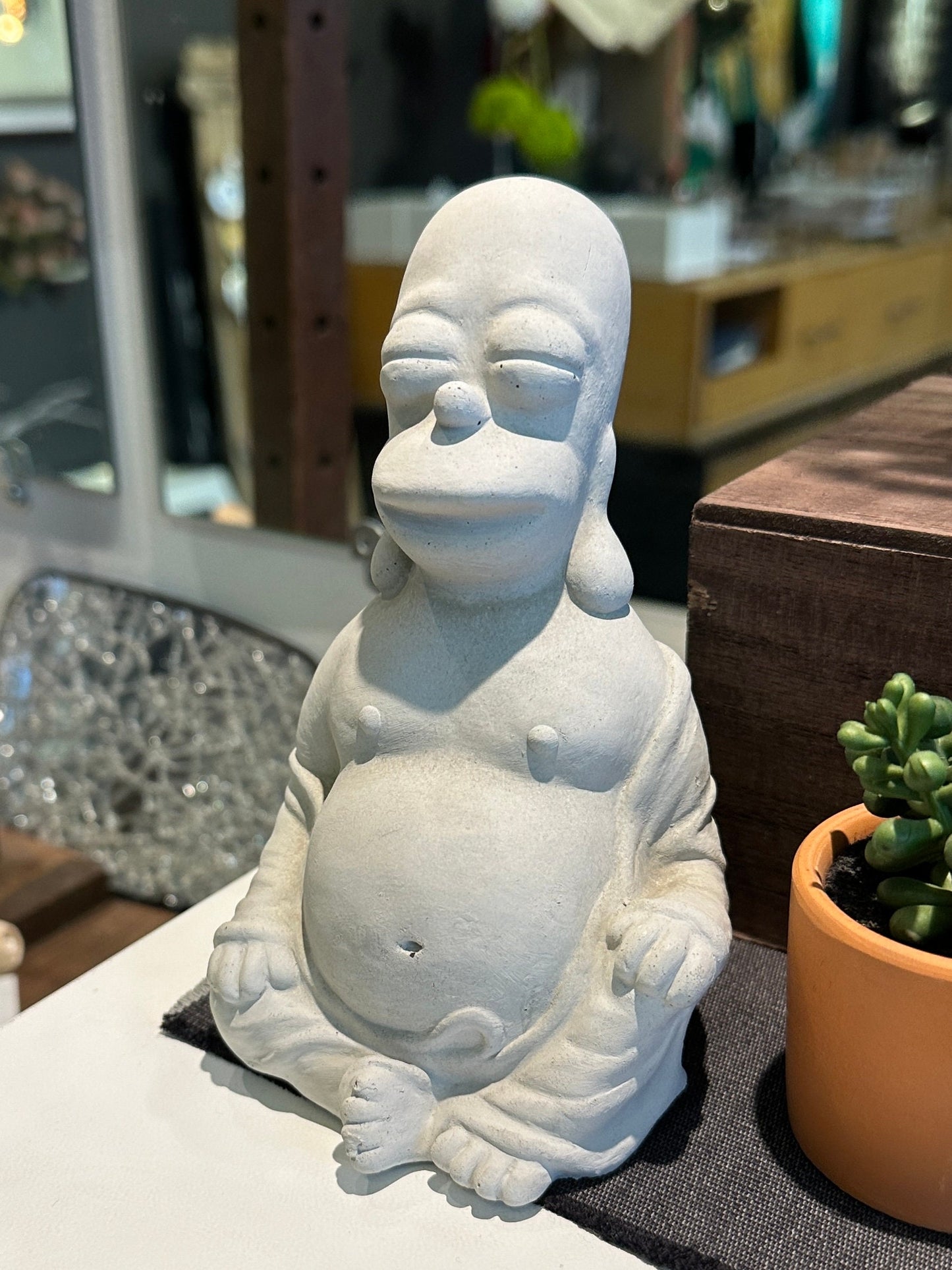 Homer Simpson Buddha concrete by Jon Ansted