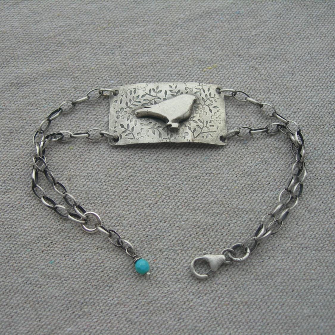 Little Bird Sterling Silver Bracelet by iNk Jewelry