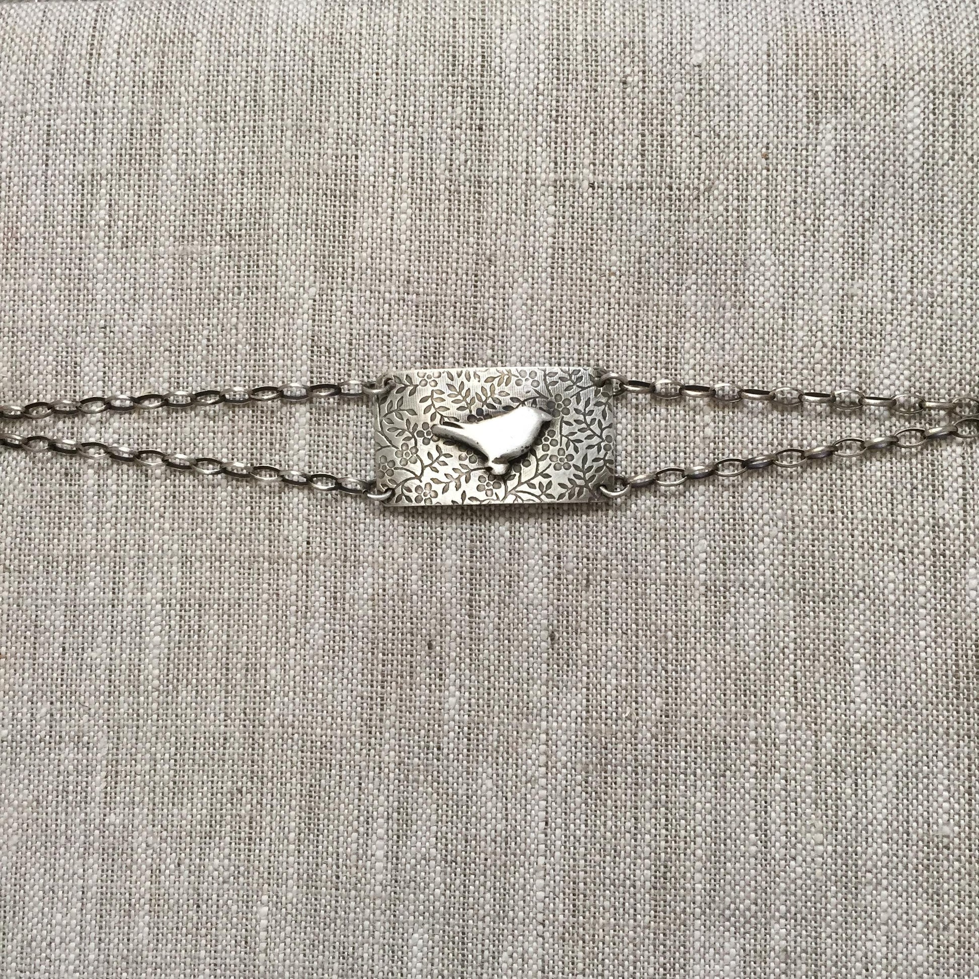 Little Bird Sterling Silver Bracelet by iNk Jewelry