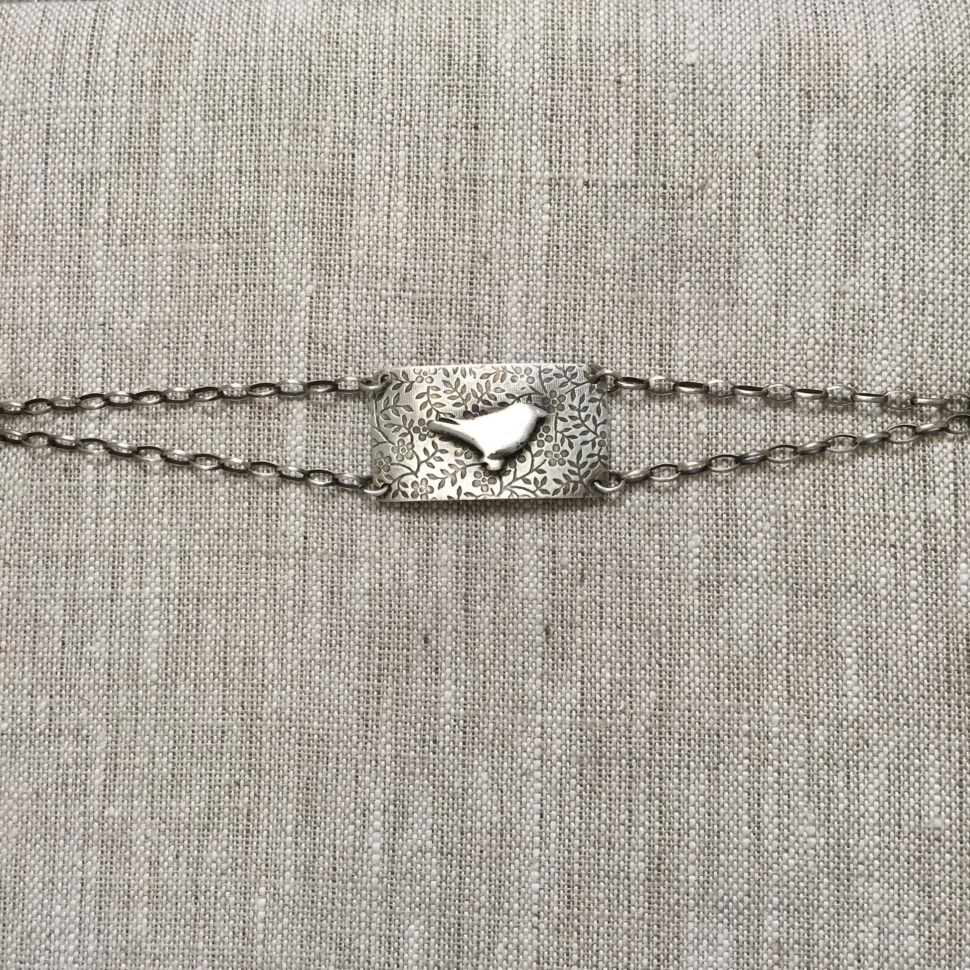 Little Bird Sterling Silver Bracelet by iNk Jewelry