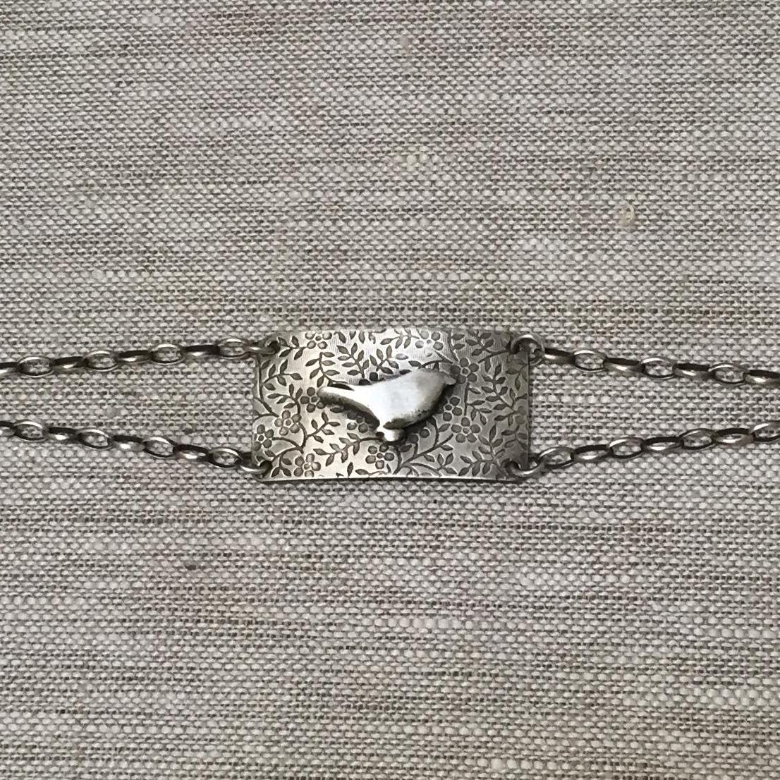 Little Bird Sterling Silver Bracelet by iNk Jewelry